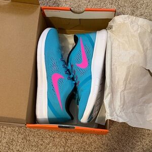 Nike Women’s Turquoise and Pink Sneakers